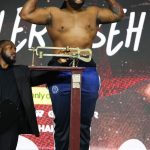 Boxer’s wig goes flying after hard punch in heavyweight bout